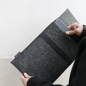 wool felt laptop sleeve dark grey setting